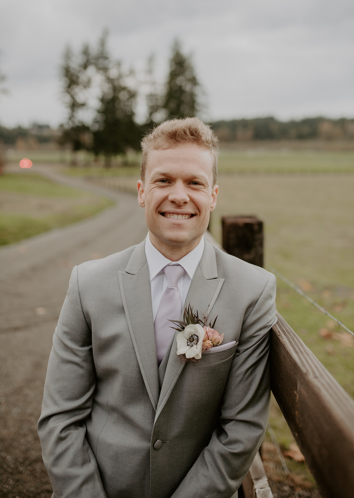 The groom with his boutonniere