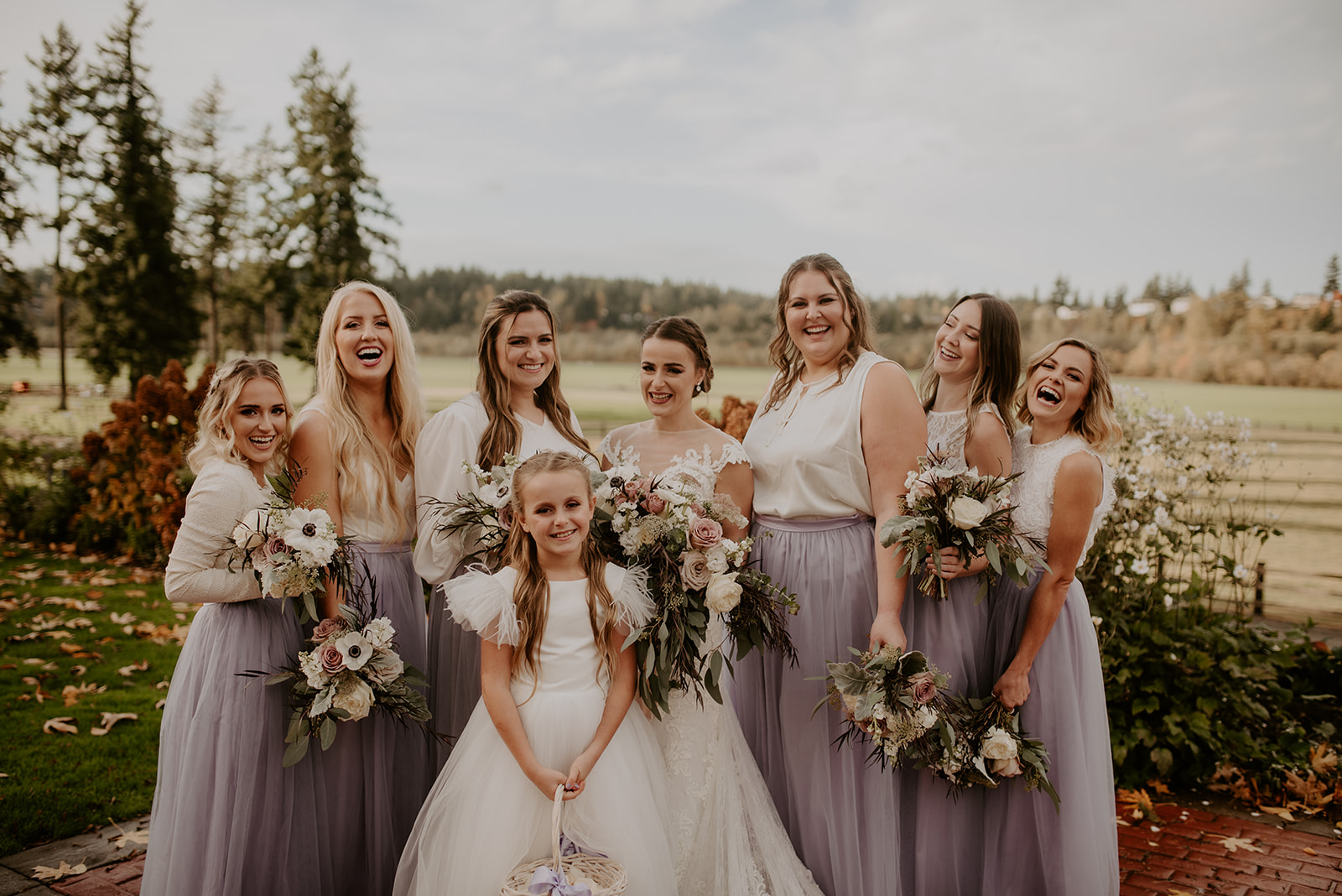 Bridesmaids and flower girl with bride