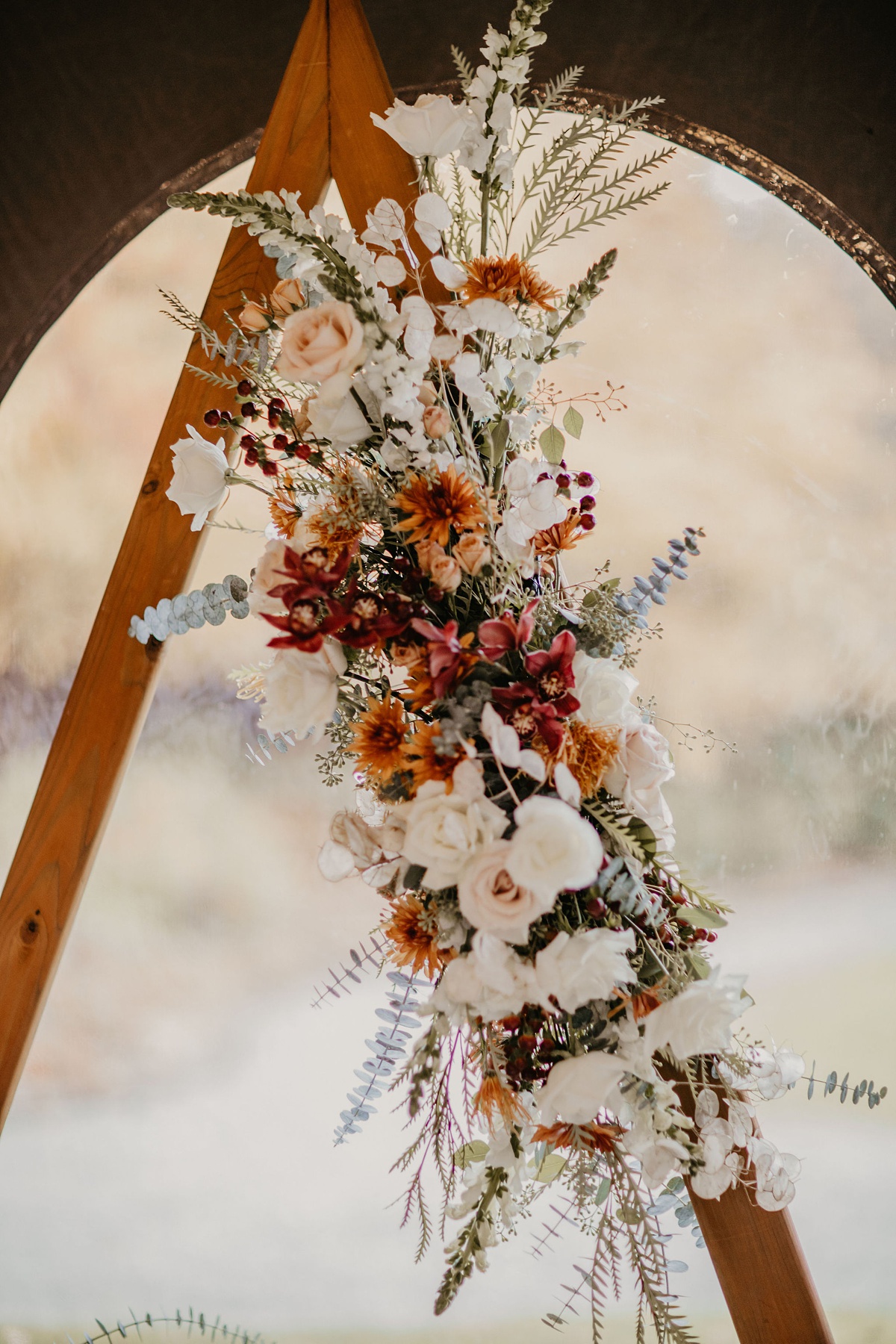 floral details of the wedding arch at the Willows Lodge