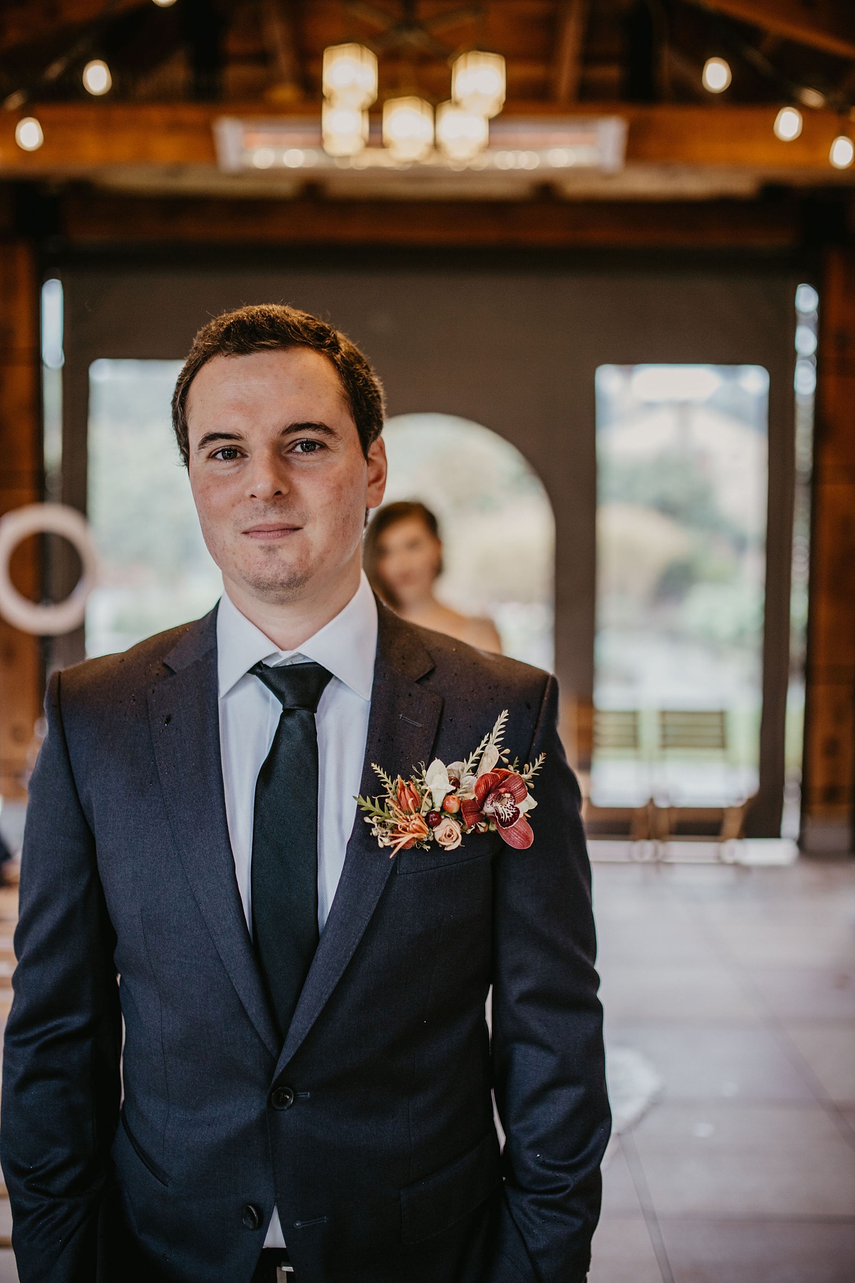 a groom awaiting his first look at the Willows Lodge