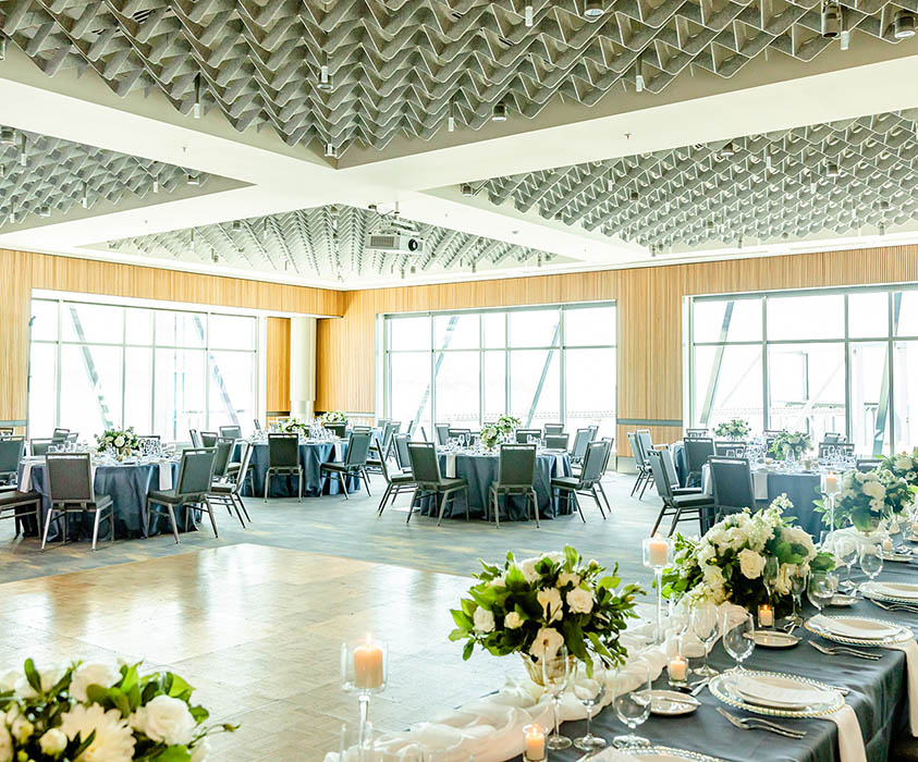 bell harbor international conference center indoor wedding venue space with tall windows and lots of natural light
