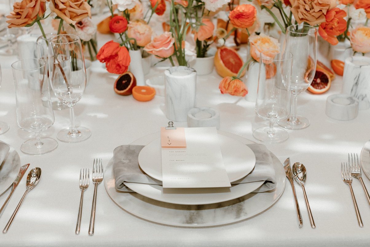 Block 41 Wedding Kings Table setting with flowers and marble chargers