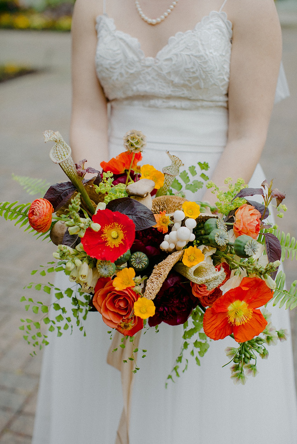 A Kiana Lodge wedding bridal bouquet with bright flowers and mushrooms
