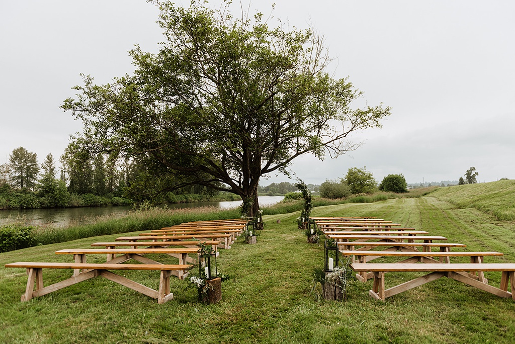 Ceremony setup with benches and florals