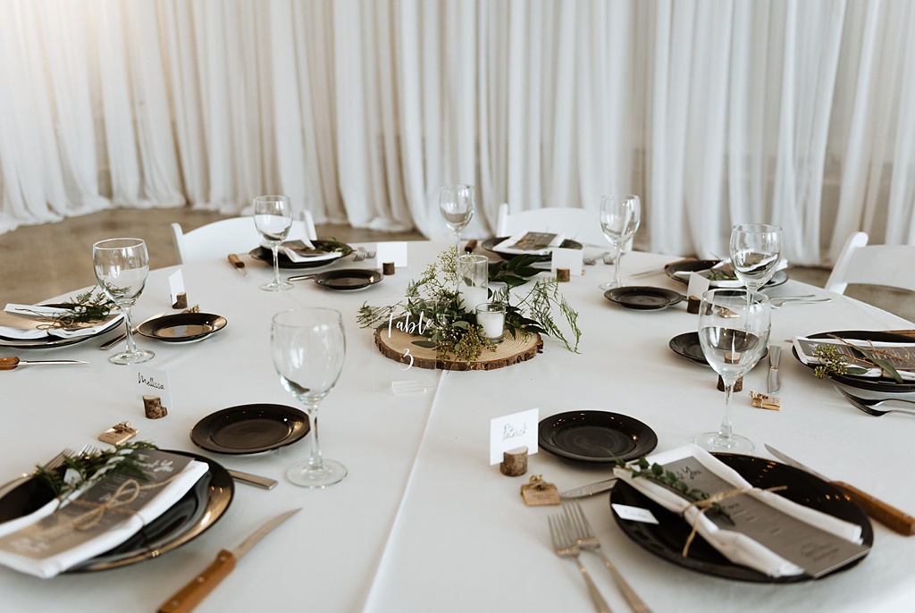 Black and white themed reception tables at a wedding at Pemberton Farm