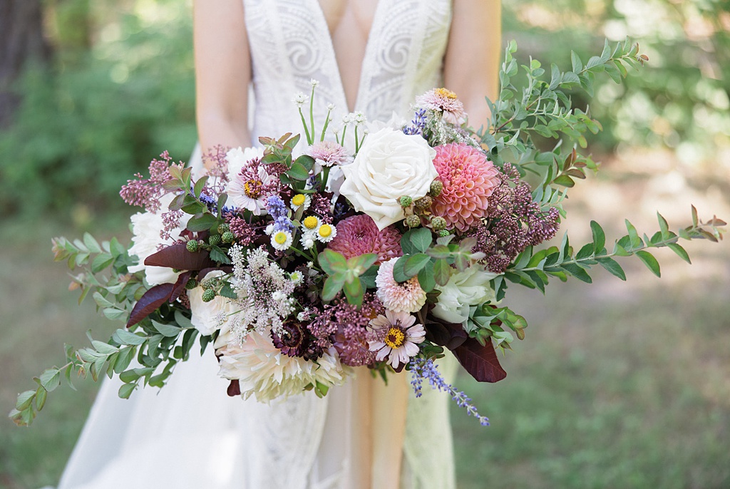 A detailed look at this stunning bridal bouquet at the Tierra Retreat Center wedding