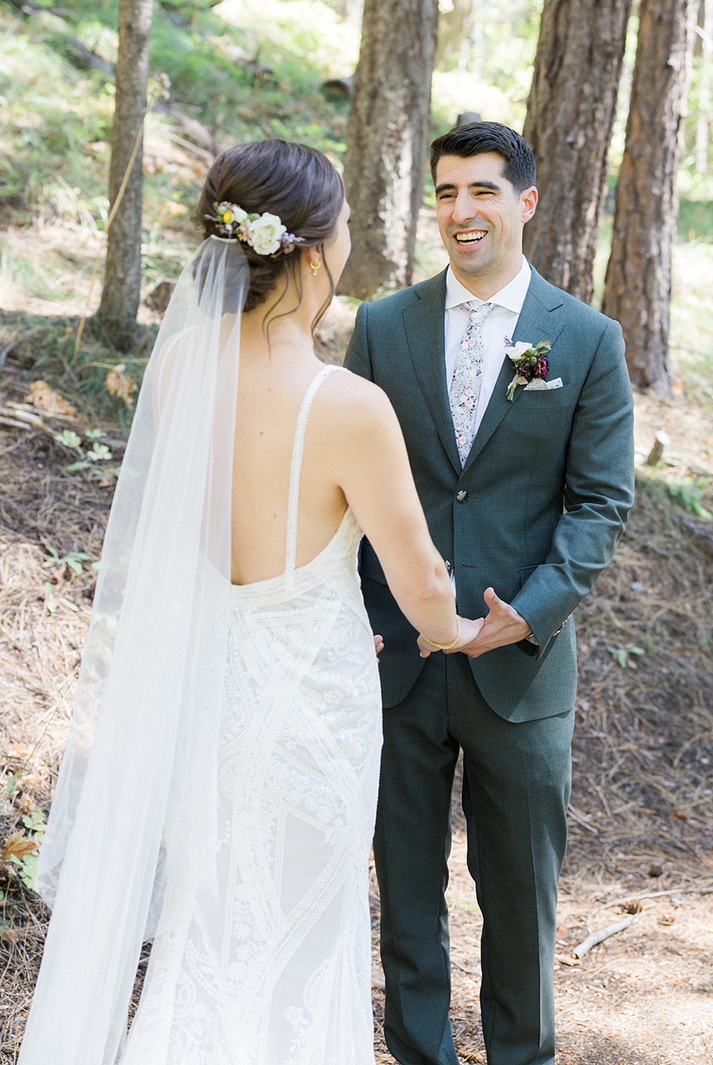 The bride and groom enjoy a first look at this Tierra Retreat Center wedding