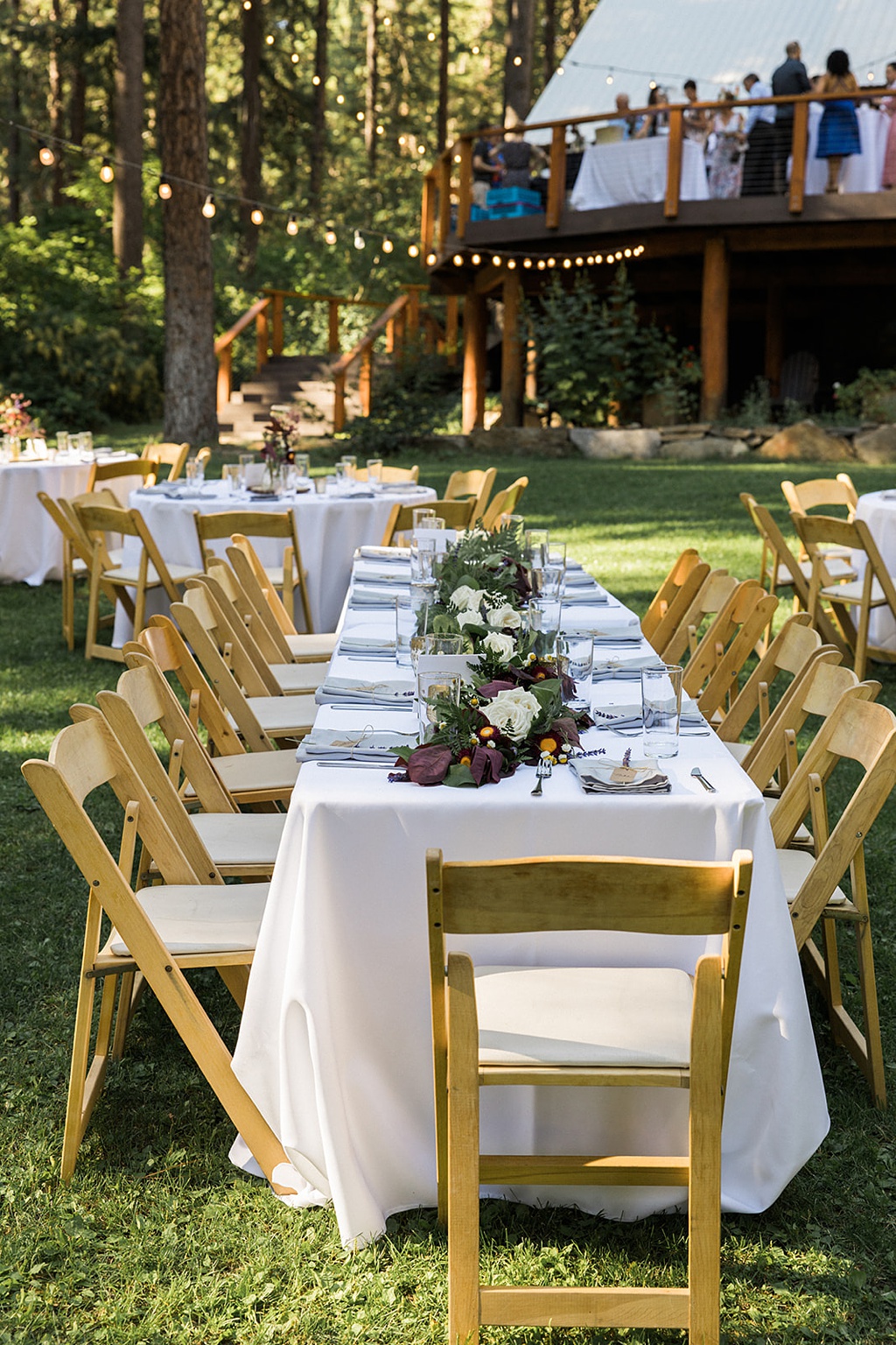 Wedding florals drape the long tables at this Tierra Retreat Center wedding