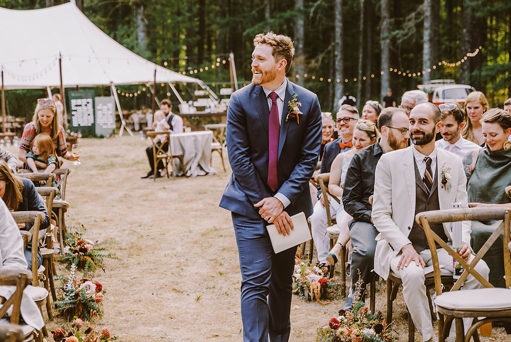 The groom walks down his own aisle at this modern summer wedding