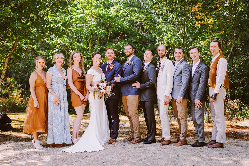 The summer wedding party with personal flowers